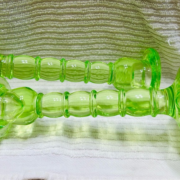 Antique vasoline glass candle stick holders, 8” tall by 4.25” wide at base. - Picture 5 of 5